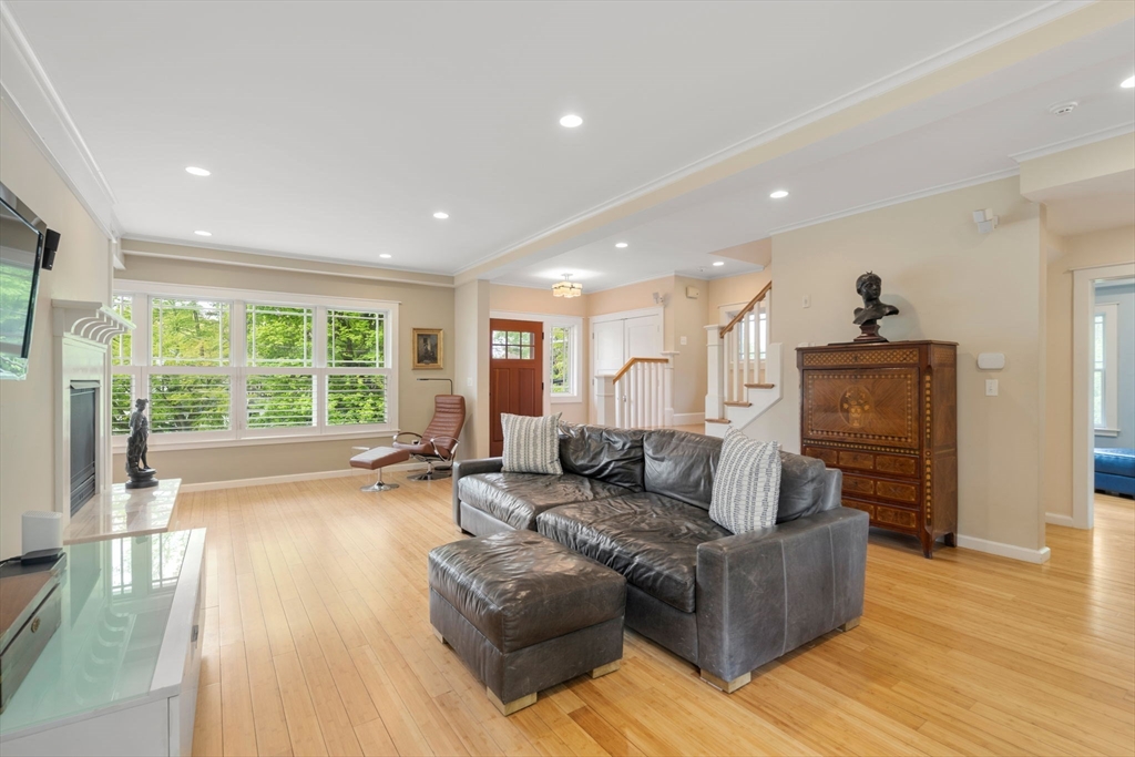 51 Avon Road Wellesley, MA 02482 - Photo 7 of 26 a living room with furniture and a large window