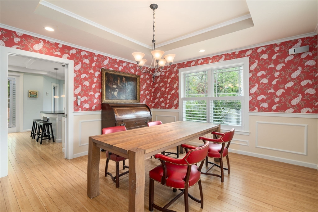 51 Avon Road Wellesley, MA 02482 - Photo 9 of 26 a view of a dining room with furniture window and wooden floor