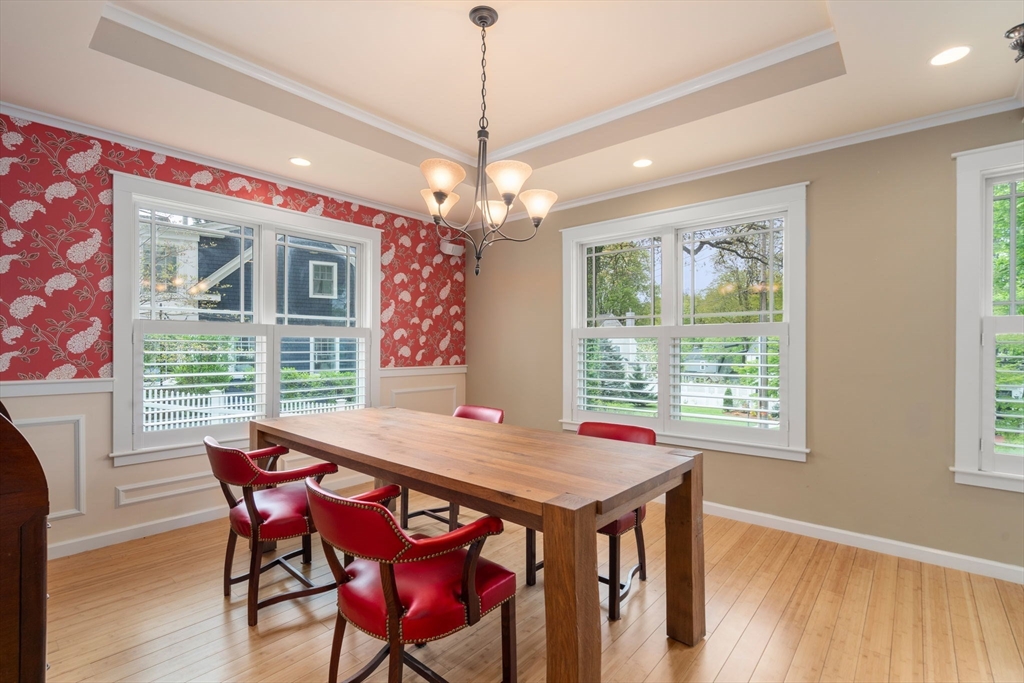 51 Avon Road Wellesley, MA 02482 - Photo 10 of 26 a view of a dining room with furniture window and wooden floor