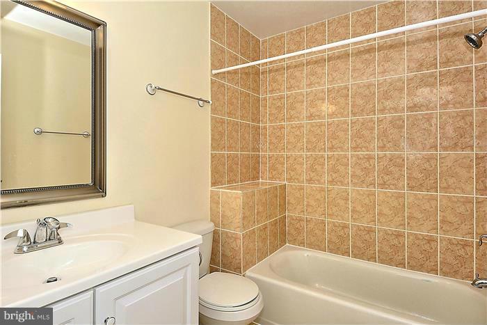 11049 Villaridge Court, Unit A Reston, VA 20191 - Photo 11 of 27 Full Bath off the hallway