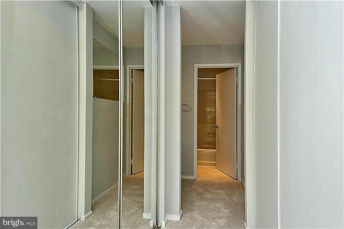 11049 Villaridge Court, Unit A Reston, VA 20191 - Photo 14 of 27 His/Hers closets in the Master Bedroom