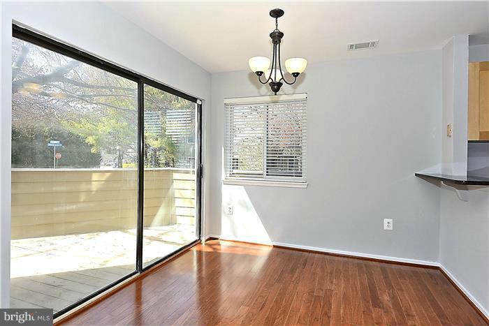 11049 Villaridge Court, Unit A Reston, VA 20191 - Photo 8 of 27 Dining Room w/ lots of natural light via 8' door