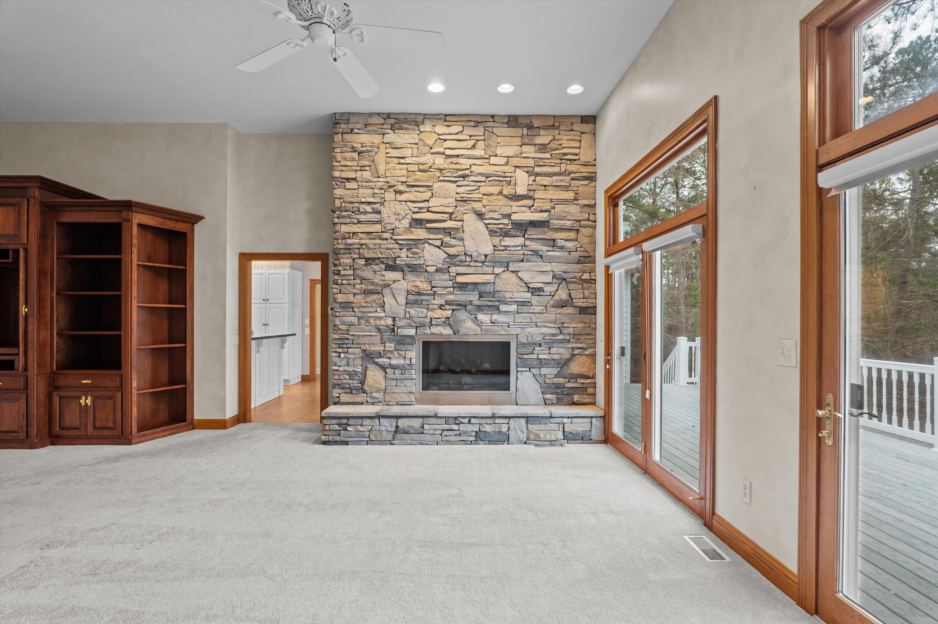 210 Daly Place McCormick, SC 29835 - Photo 12 of 58 Living room opens to large deck