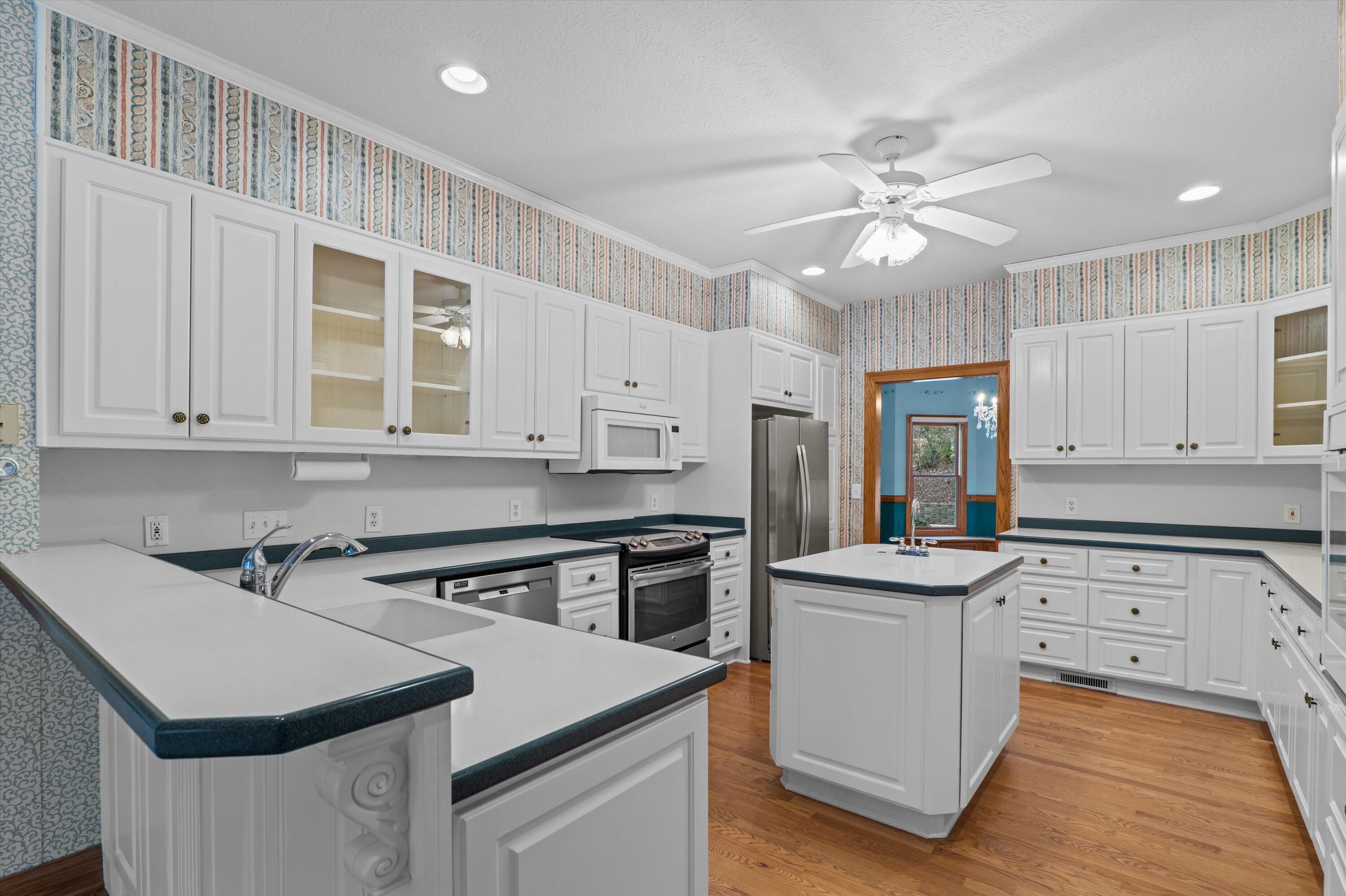 210 Daly Place McCormick, SC 29835 - Photo 14 of 58 Kitchen with prep island