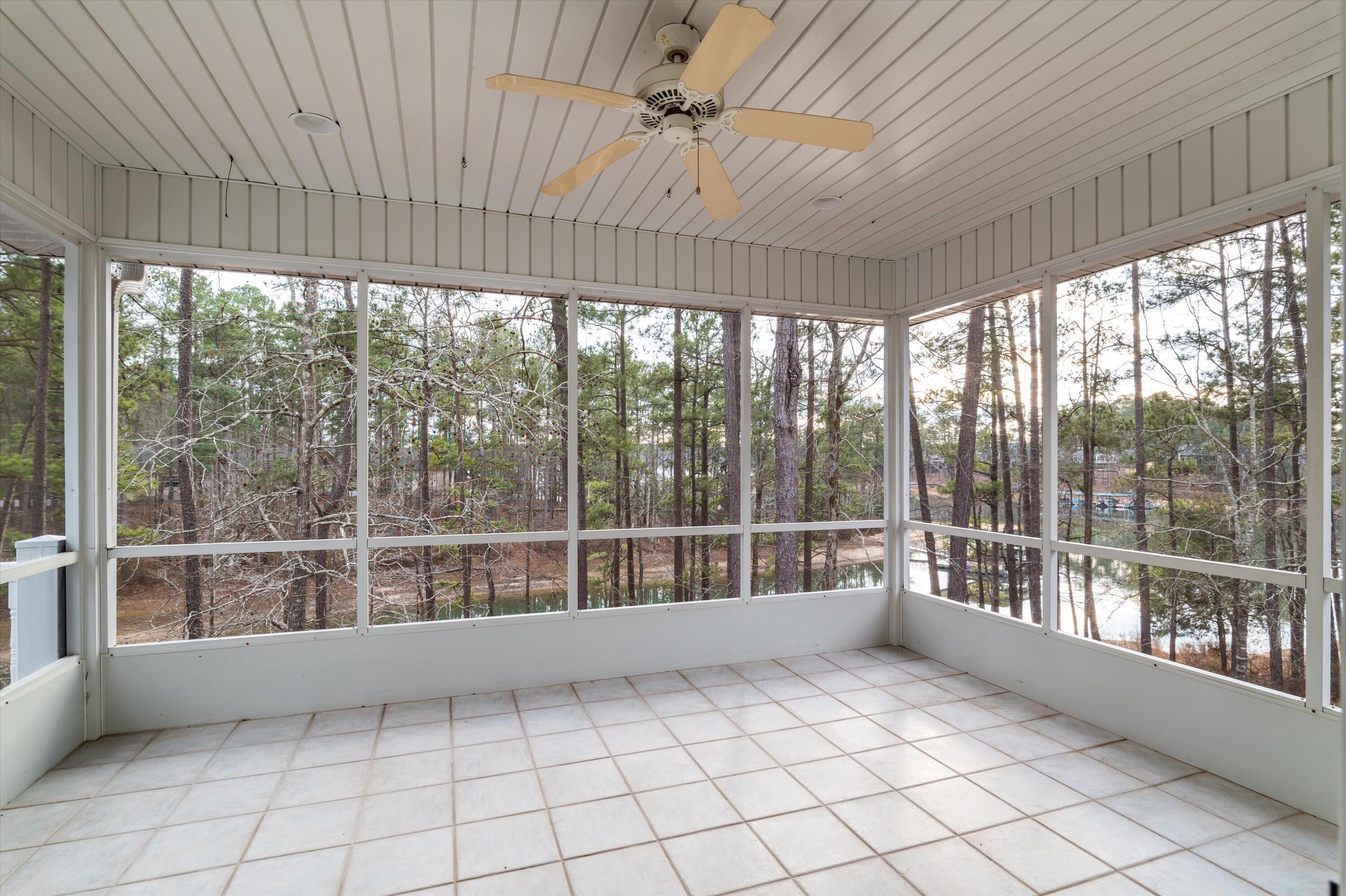 210 Daly Place McCormick, SC 29835 - Photo 28 of 58 Screen porch off of bedroom 3 with beautiful lake view