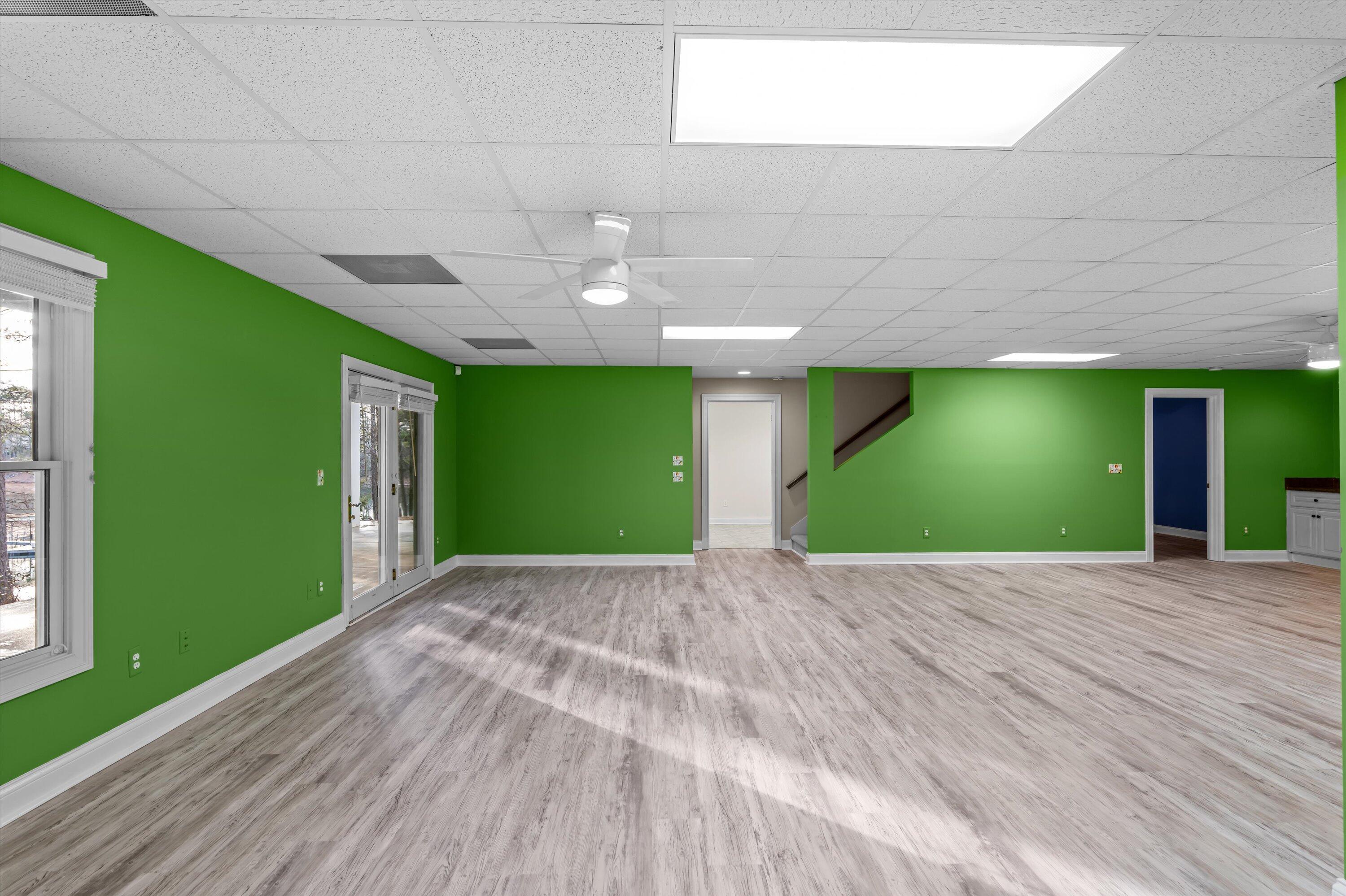 210 Daly Place McCormick, SC 29835 - Photo 31 of 58 Large lower level game room/den with access to covered patio