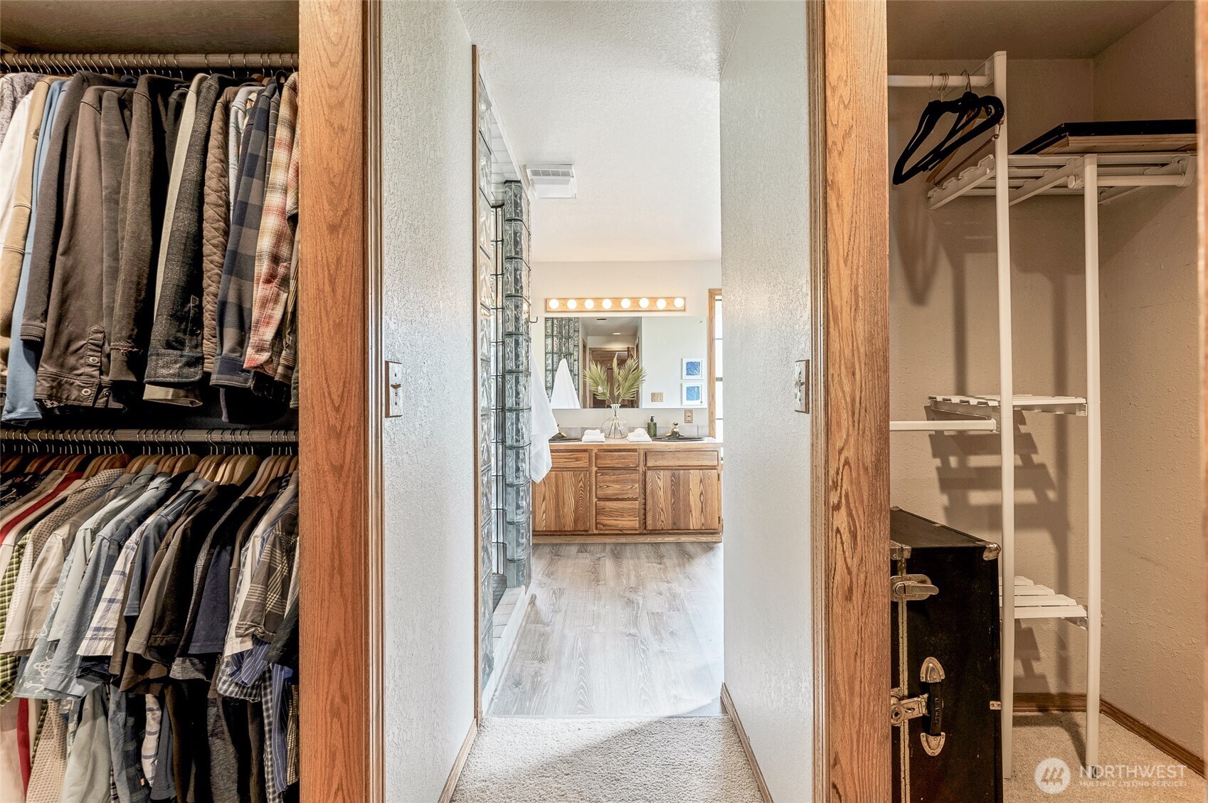 9656 North Road Peshastin, WA 98847 - Photo 22 of 40 a view of walk in closet with clothes and shoes