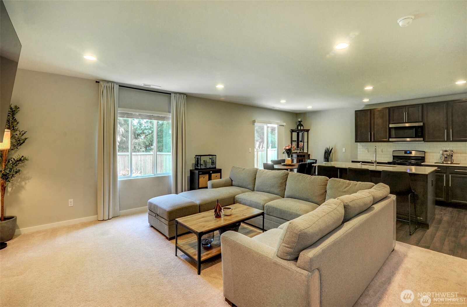 1326 11th Street Sultan, WA 98294 - Photo 3 of 31 a living room with furniture and a flat screen tv