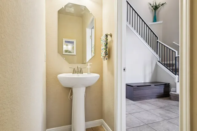 a view of a hallway with staircase