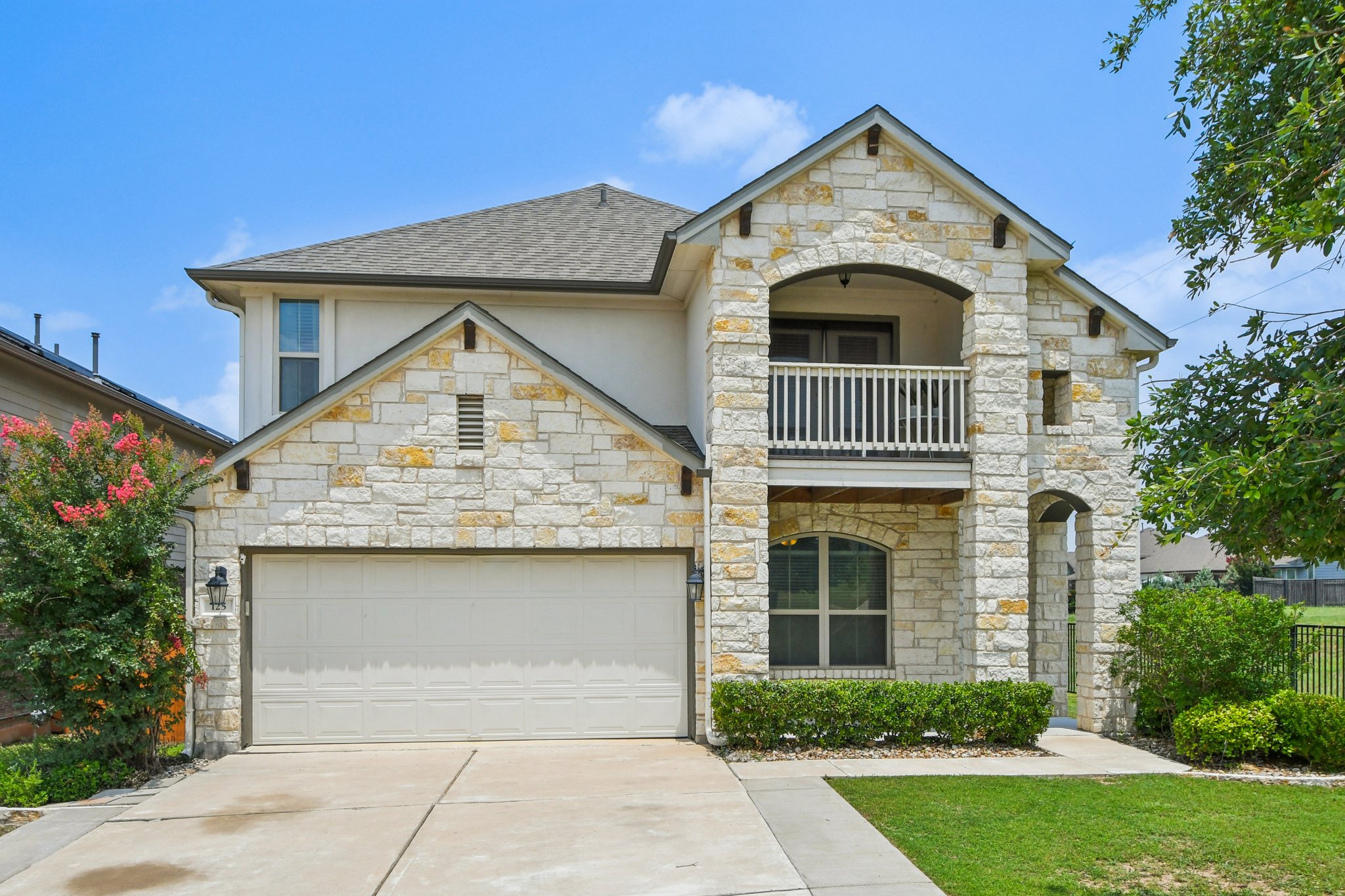 125 Checkerspot Court Georgetown, TX 78626 - Photo 2 of 40 a front view of a house with garage