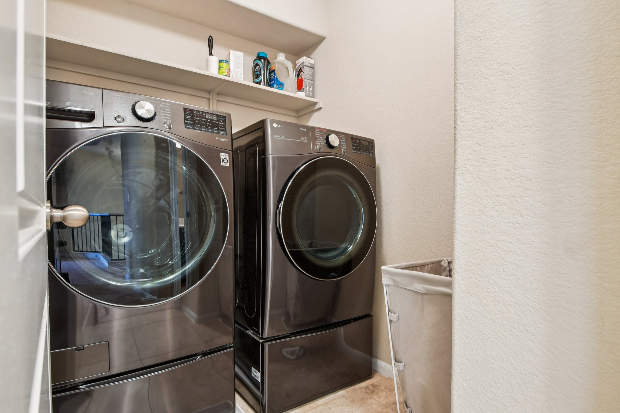 125 Checkerspot Court Georgetown, TX 78626 - Photo 26 of 40 a utility room with dryer and washer