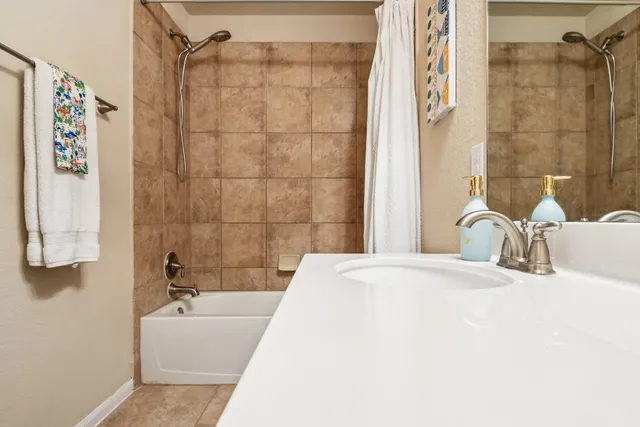 a bathroom with a sink and a bathtub
