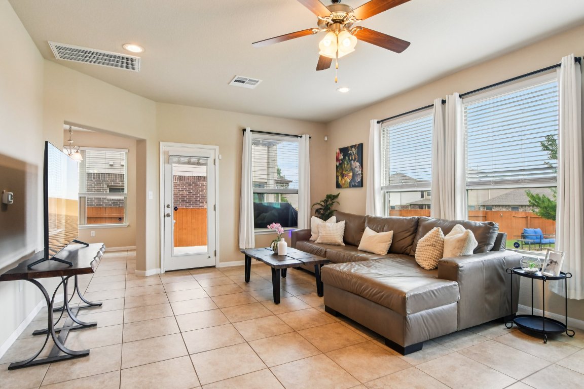 125 Checkerspot Court Georgetown, TX 78626 - Photo 3 of 40 a living room with furniture and a large window