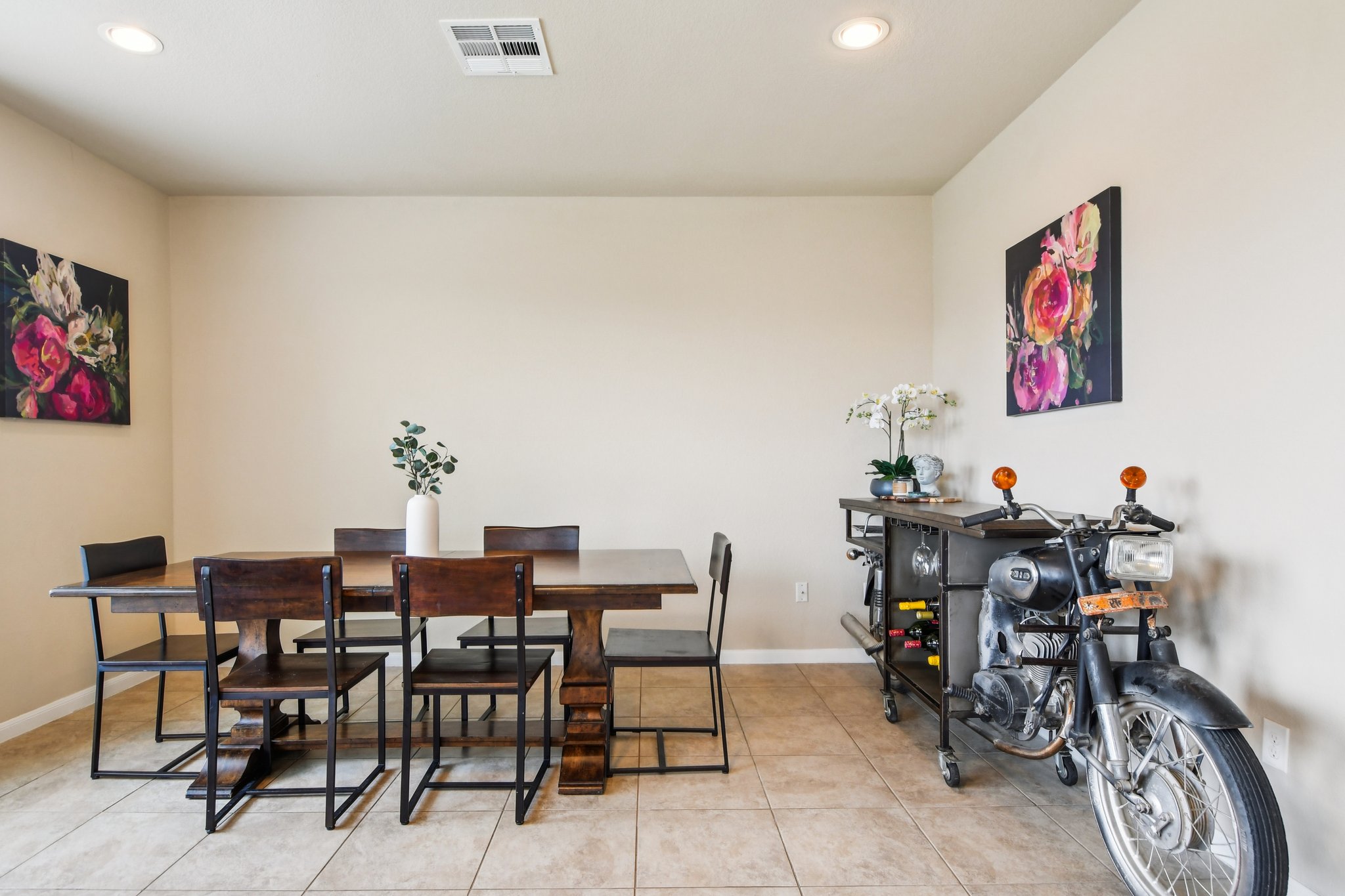 125 Checkerspot Court Georgetown, TX 78626 - Photo 6 of 40 a view of a dining room with furniture and a kitchen
