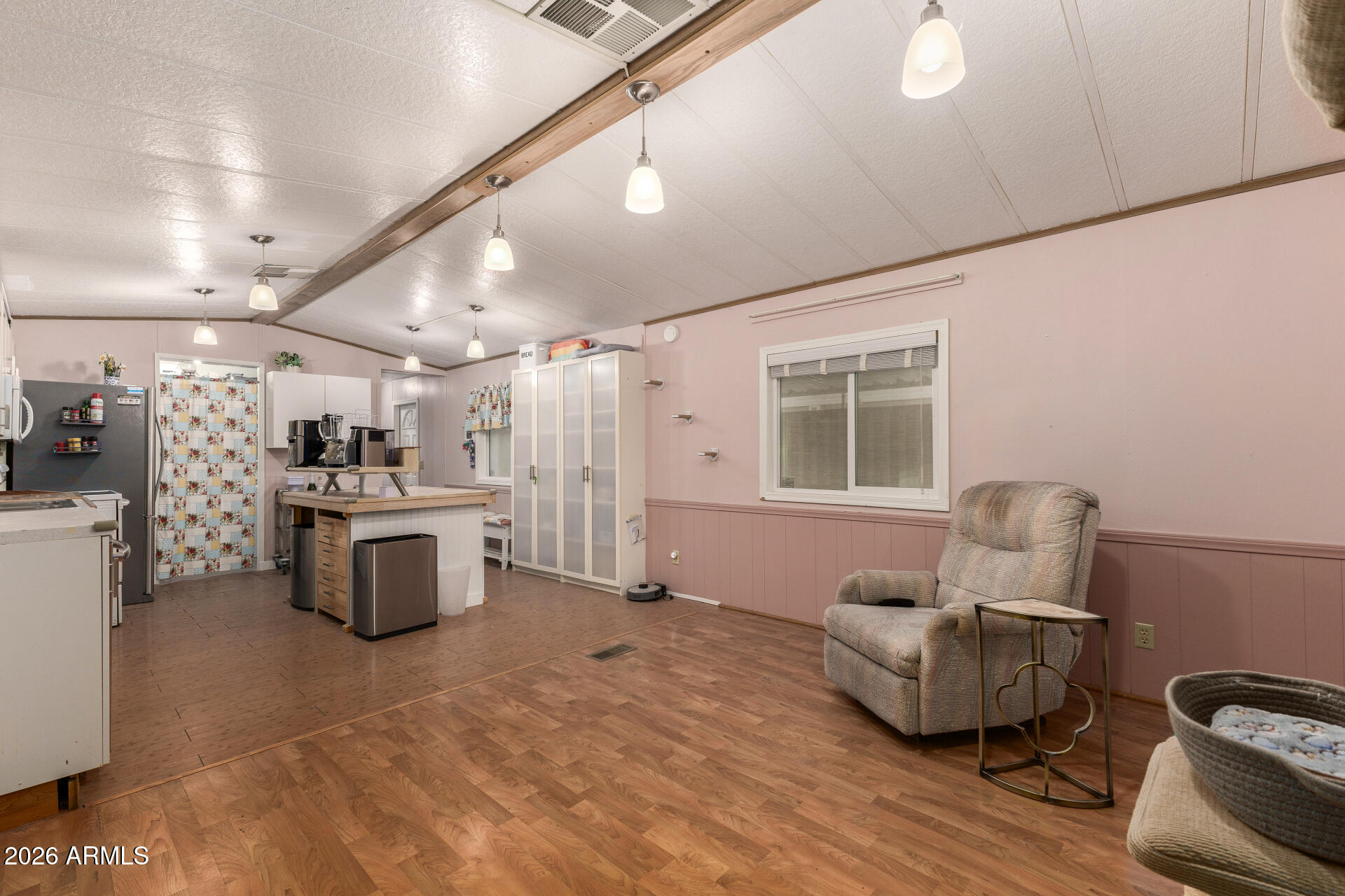 834 South Meridian Road, Unit 144 Apache Junction, AZ 85120 - Photo 11 of 43 a living room with furniture and a large window