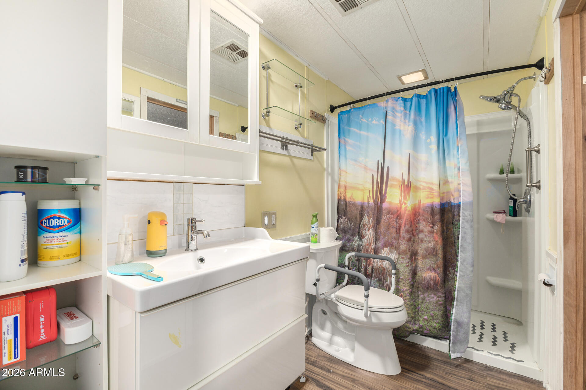 834 South Meridian Road, Unit 144 Apache Junction, AZ 85120 - Photo 21 of 43 a bathroom with a sink a toilet and shower