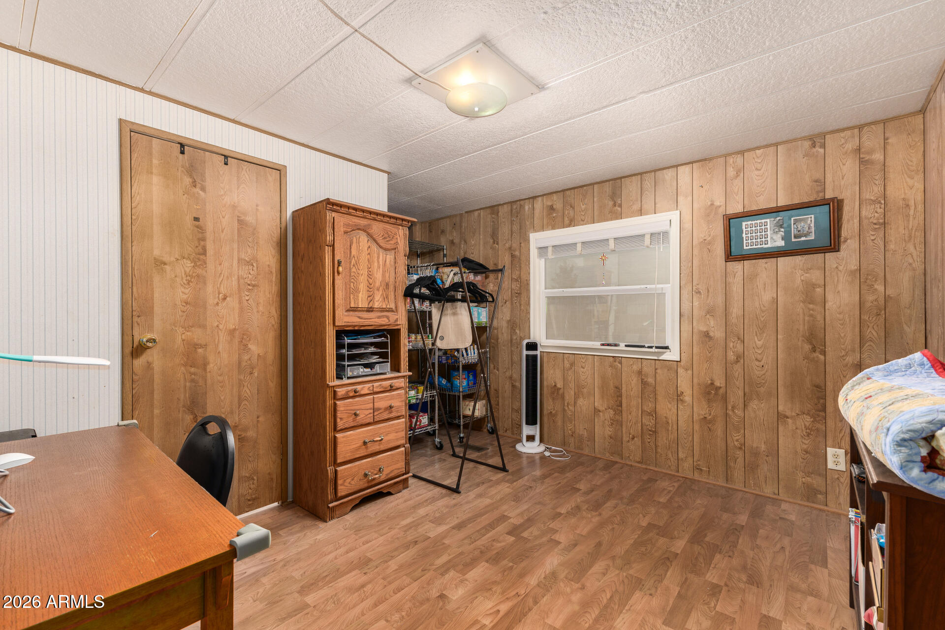 834 South Meridian Road, Unit 144 Apache Junction, AZ 85120 - Photo 23 of 43 a view of a workspace with furniture and a window
