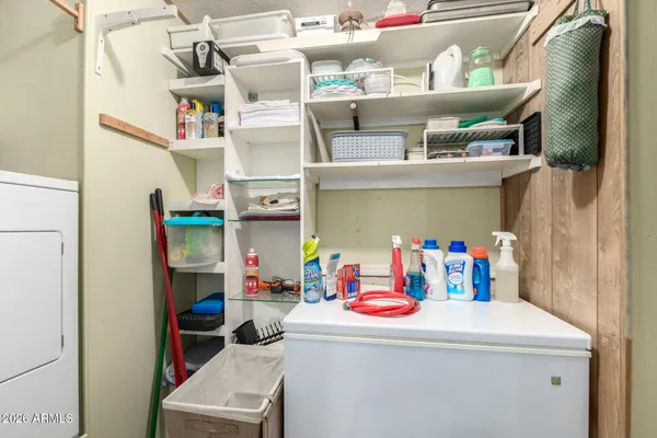 a utility room with washer and dryer