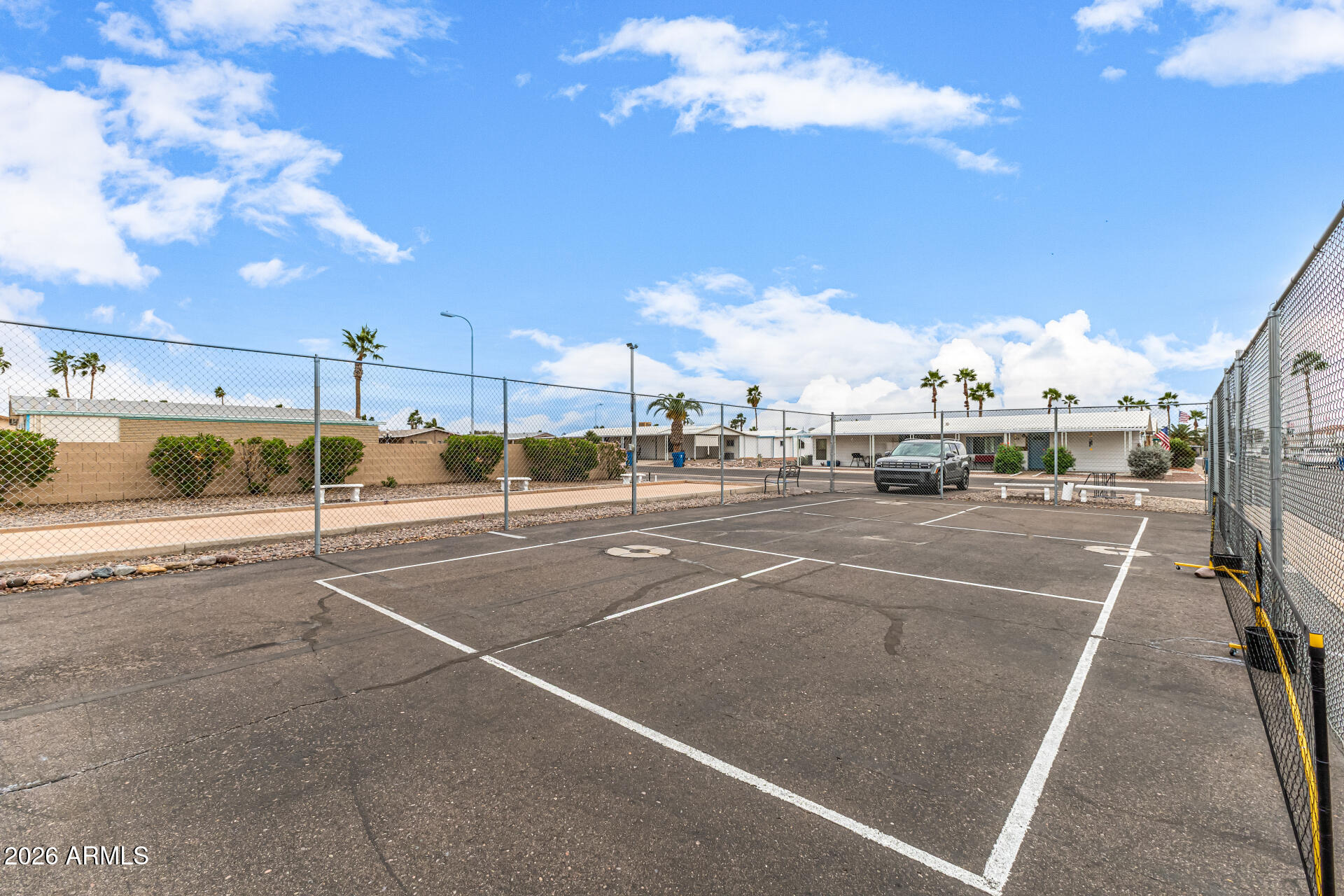 834 South Meridian Road, Unit 144 Apache Junction, AZ 85120 - Photo 34 of 43 a view of a tennis court