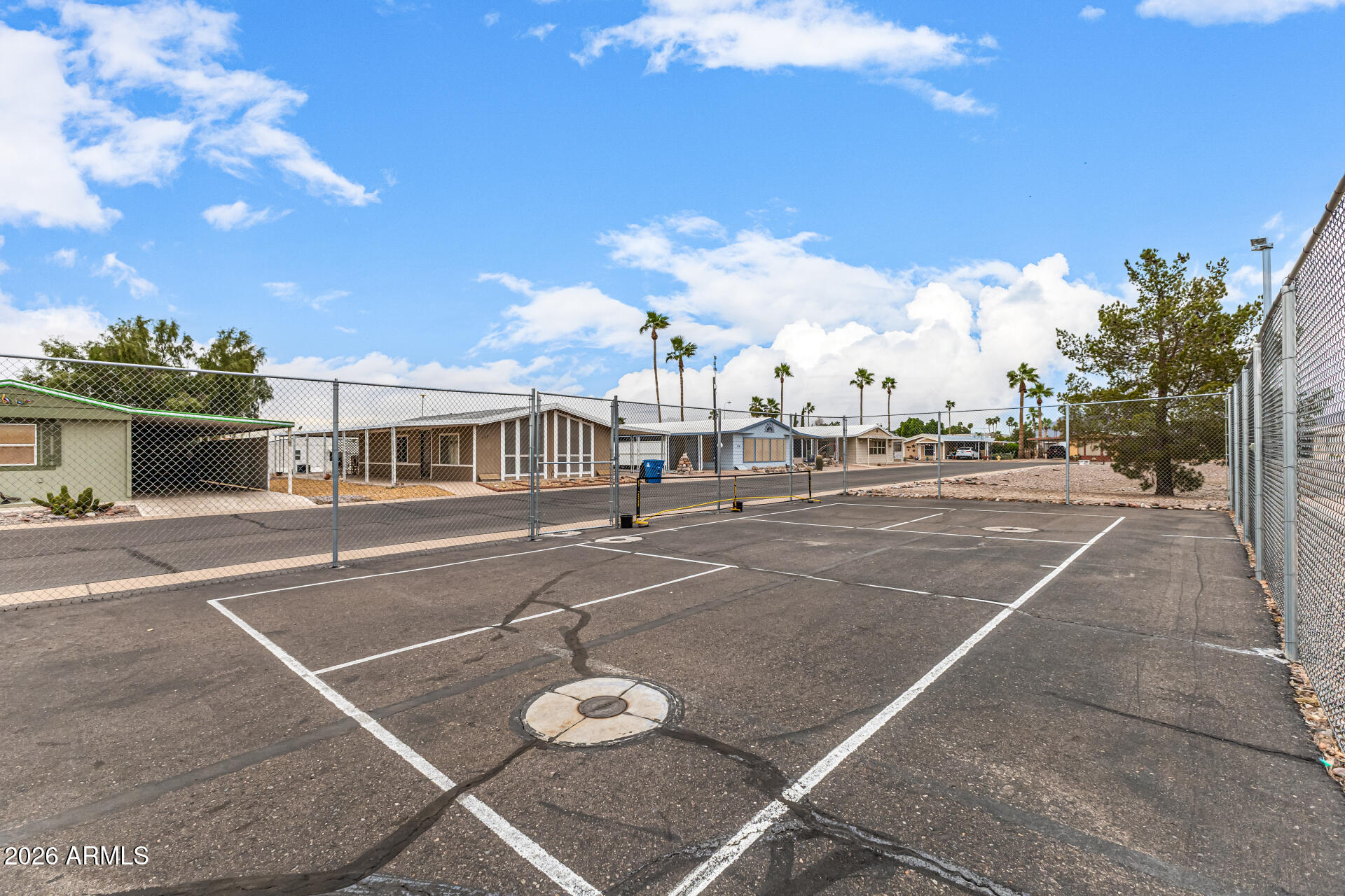 834 South Meridian Road, Unit 144 Apache Junction, AZ 85120 - Photo 36 of 43 a view of a basket ball ground