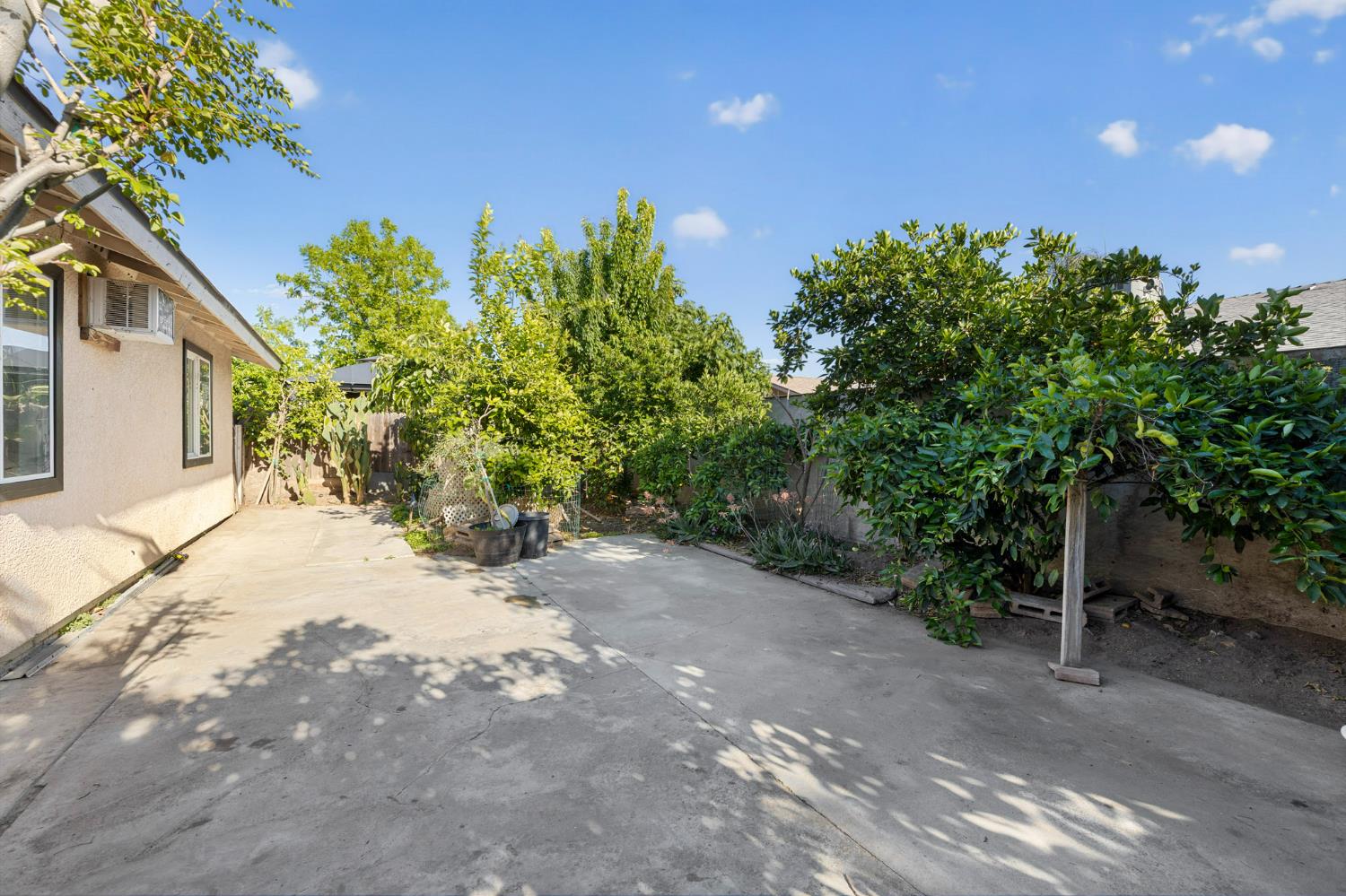 13591 East 5th Street Parlier, CA 93648 - Photo 30 of 31 a pathway with a yard