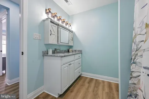 a bed room with a bed and a window