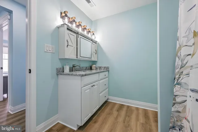 a bed room with a bed and a window