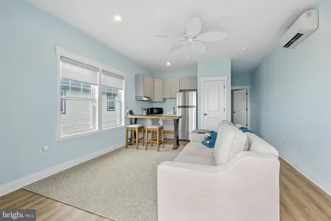 an outdoor view of balcony with wooden floor
