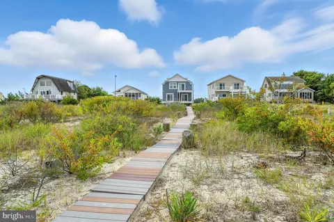 a view of a balcony with wooden floor