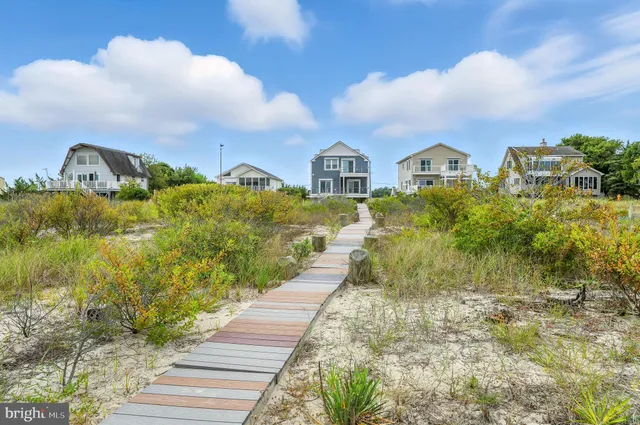 a view of a balcony with wooden floor