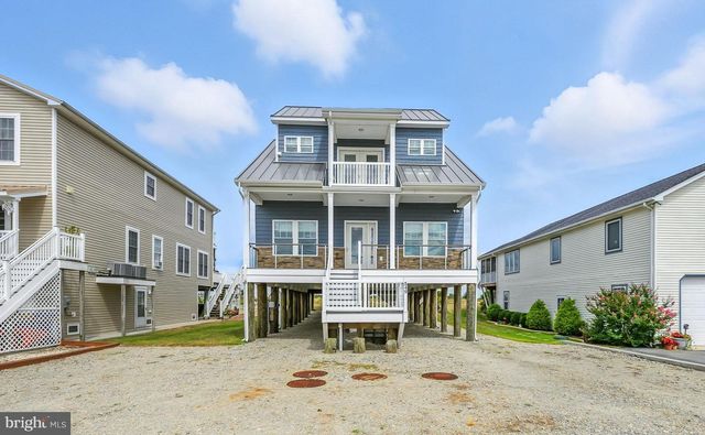 a view of a house with a porch