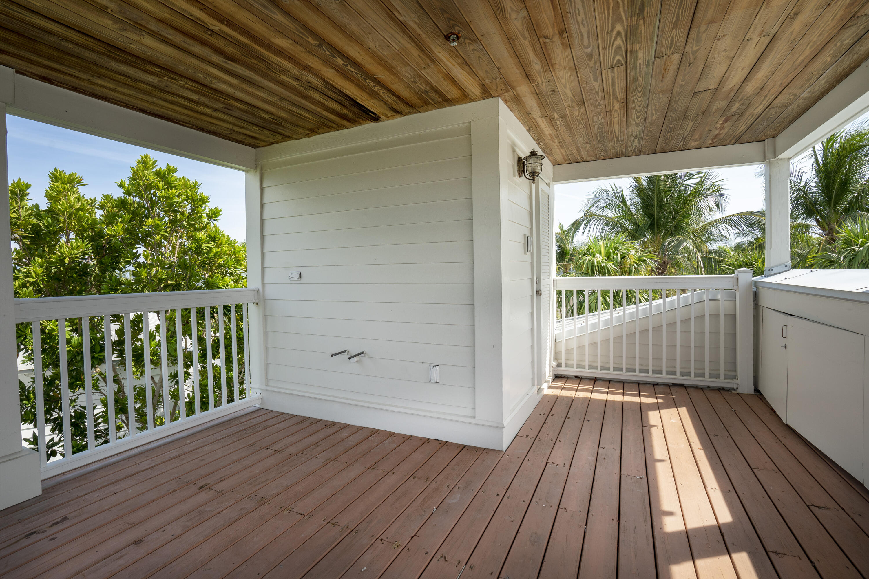 70 Sunset Key Drive Key West, FL 33040 - Photo 18 of 22 a view of balcony with wooden floor