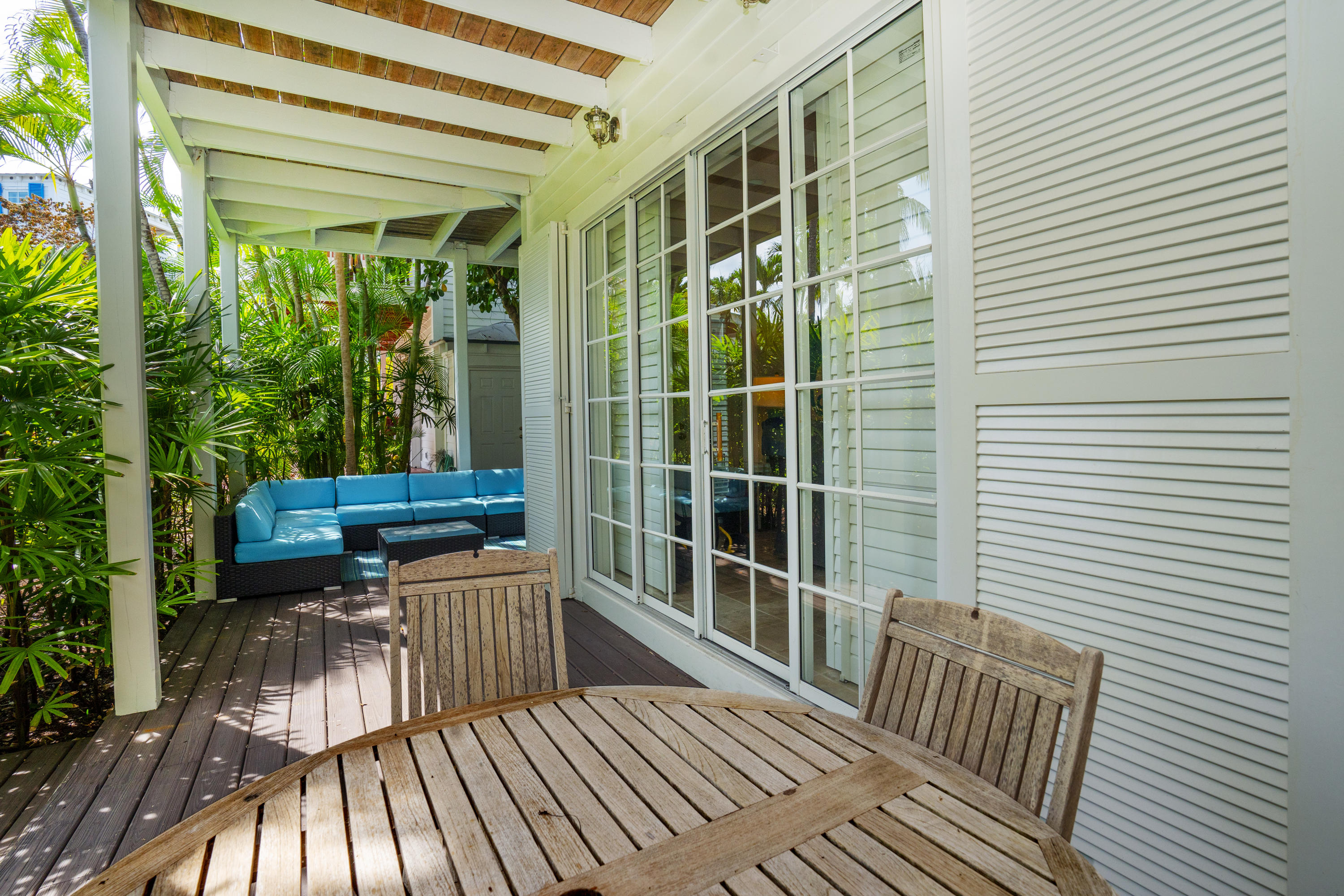 70 Sunset Key Drive Key West, FL 33040 - Photo 21 of 22 a view of a chair and table in the balcony