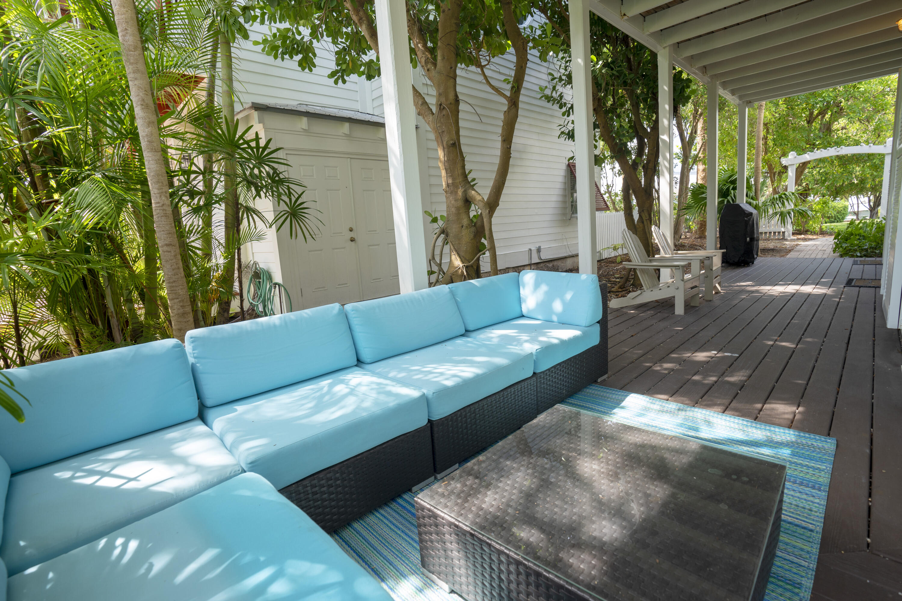 70 Sunset Key Drive Key West, FL 33040 - Photo 22 of 22 a view of an outdoor sitting area with a couch