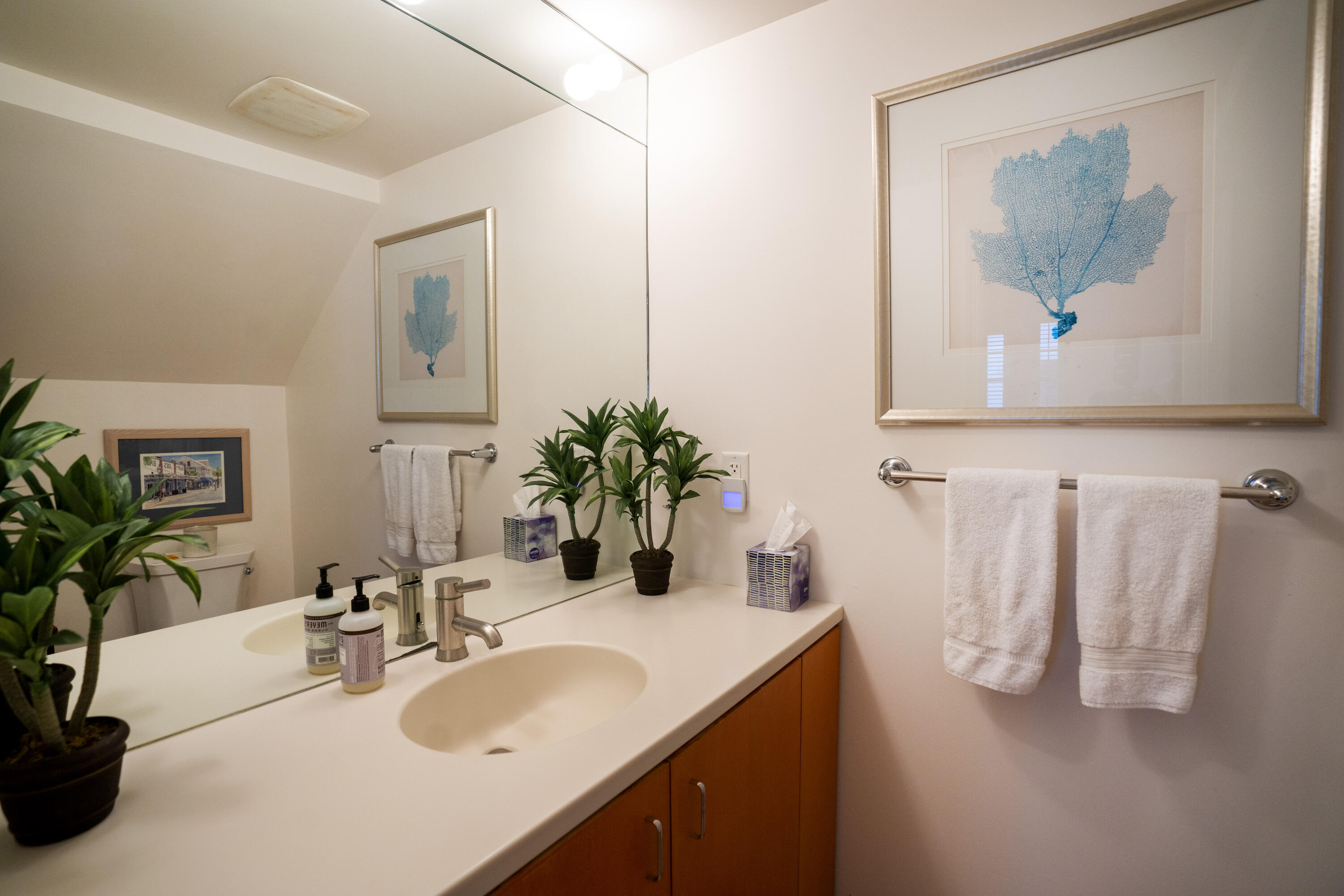 70 Sunset Key Drive Key West, FL 33040 - Photo 6 of 22 a bathroom with a sink and a mirror