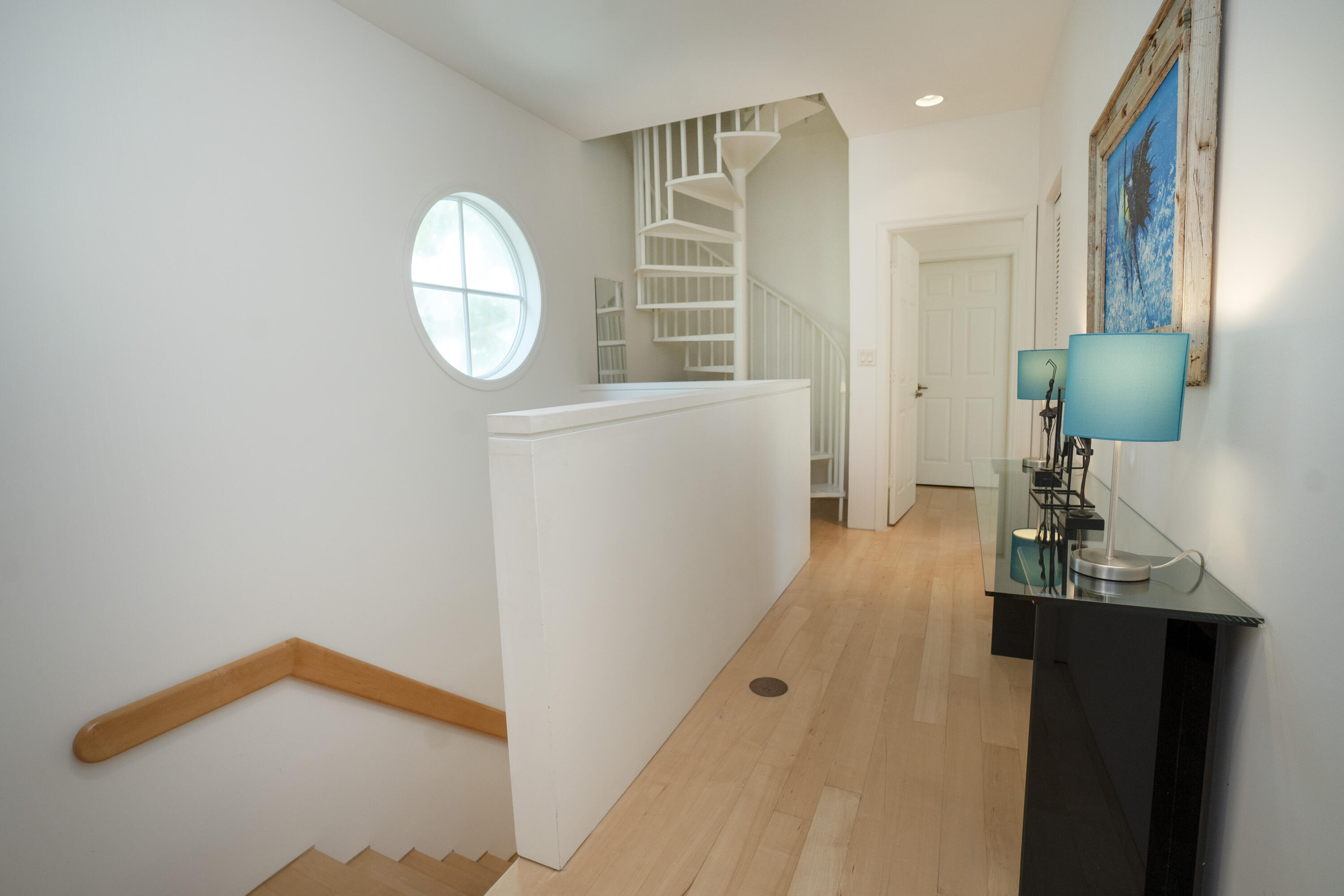 70 Sunset Key Drive Key West, FL 33040 - Photo 8 of 22 a view of hallway with furniture and a mirror