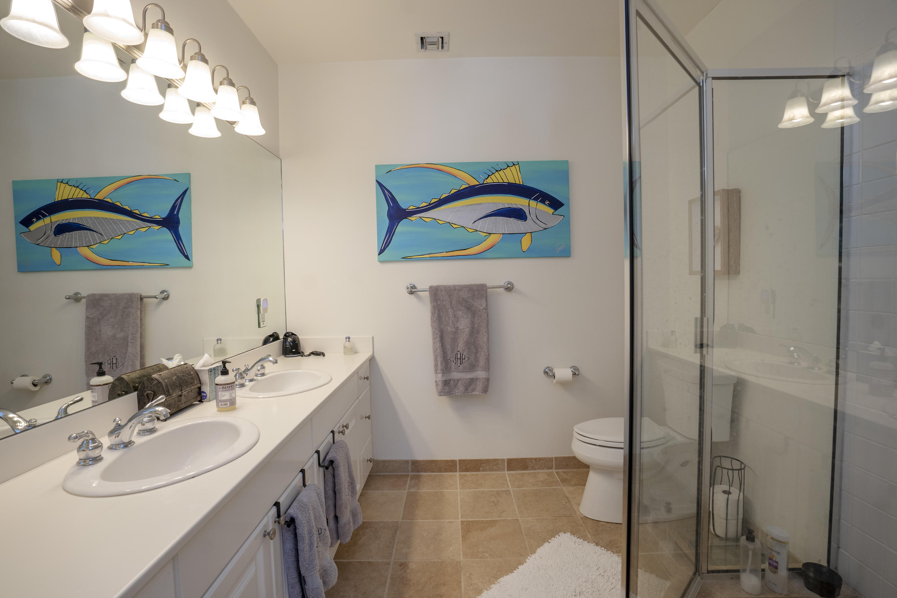 70 Sunset Key Drive Key West, FL 33040 - Photo 10 of 22 a bathroom with a sink a vanity and a mirror