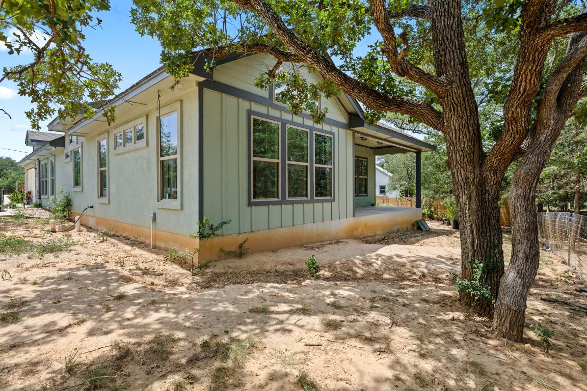 390 Riddle Road Cedar Creek, TX 78612 - Photo 26 of 27 a view of a house with a tree in the background