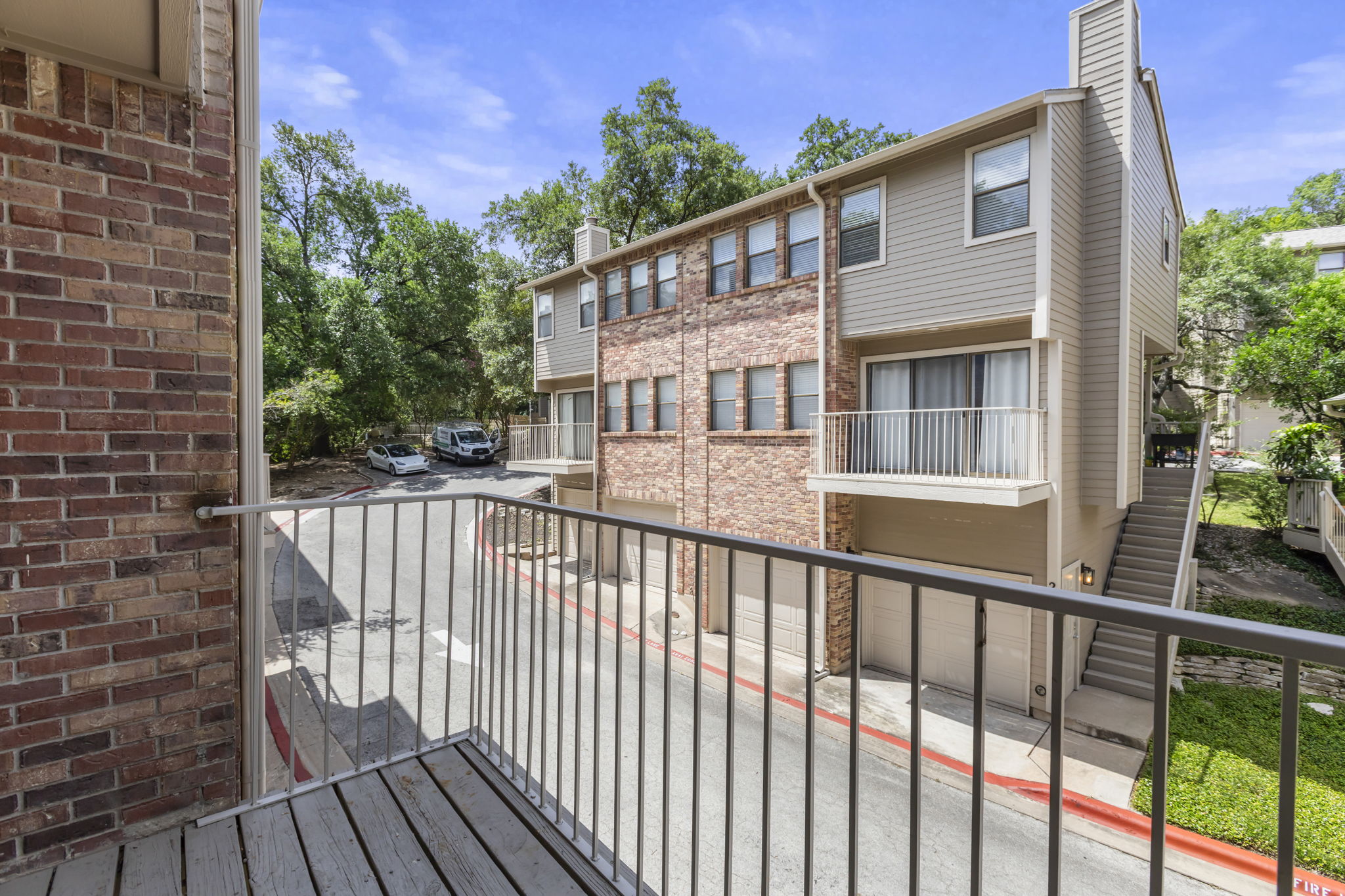 3845 Ranch Road 2222, Unit 26/M2 Austin, TX 78731 - Photo 20 of 21 Short distance from the pool and 2 guest parking spaces.