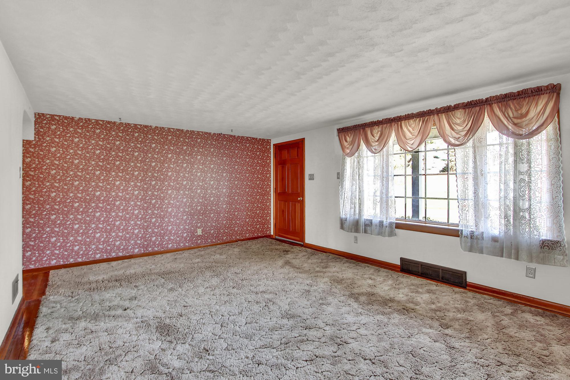 2300 Cedar Road York, PA 17408 - Photo 3 of 25 an empty room with windows