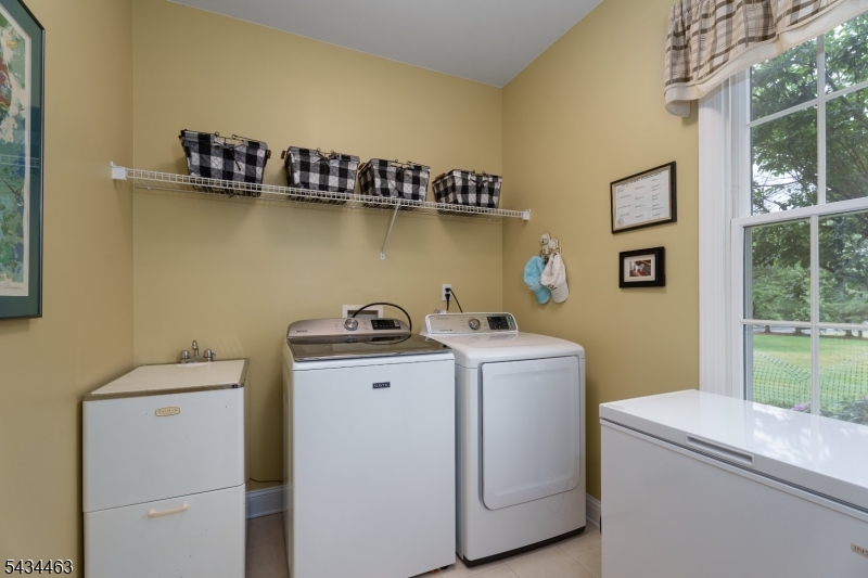 110 Orchard Road Skillman, NJ 08558 - Photo 21 of 43 a utility room with dryer and washer