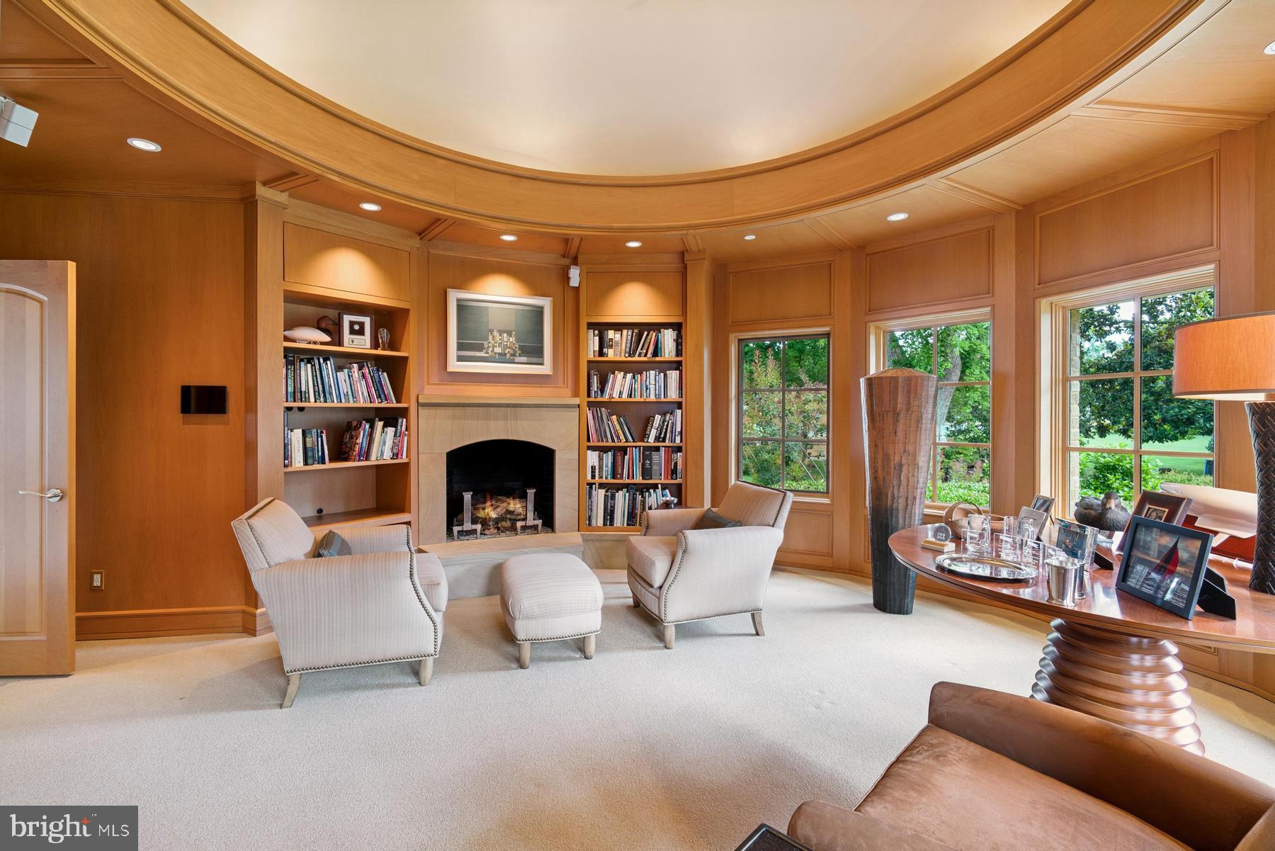 7090 Cooper Point Road Bozman, MD 21612 - Photo 14 of 86 a living room with furniture and a fireplace