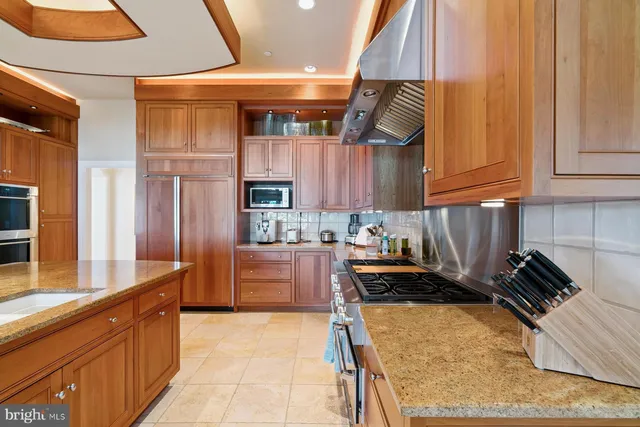 a utility room with sink dryer and washer