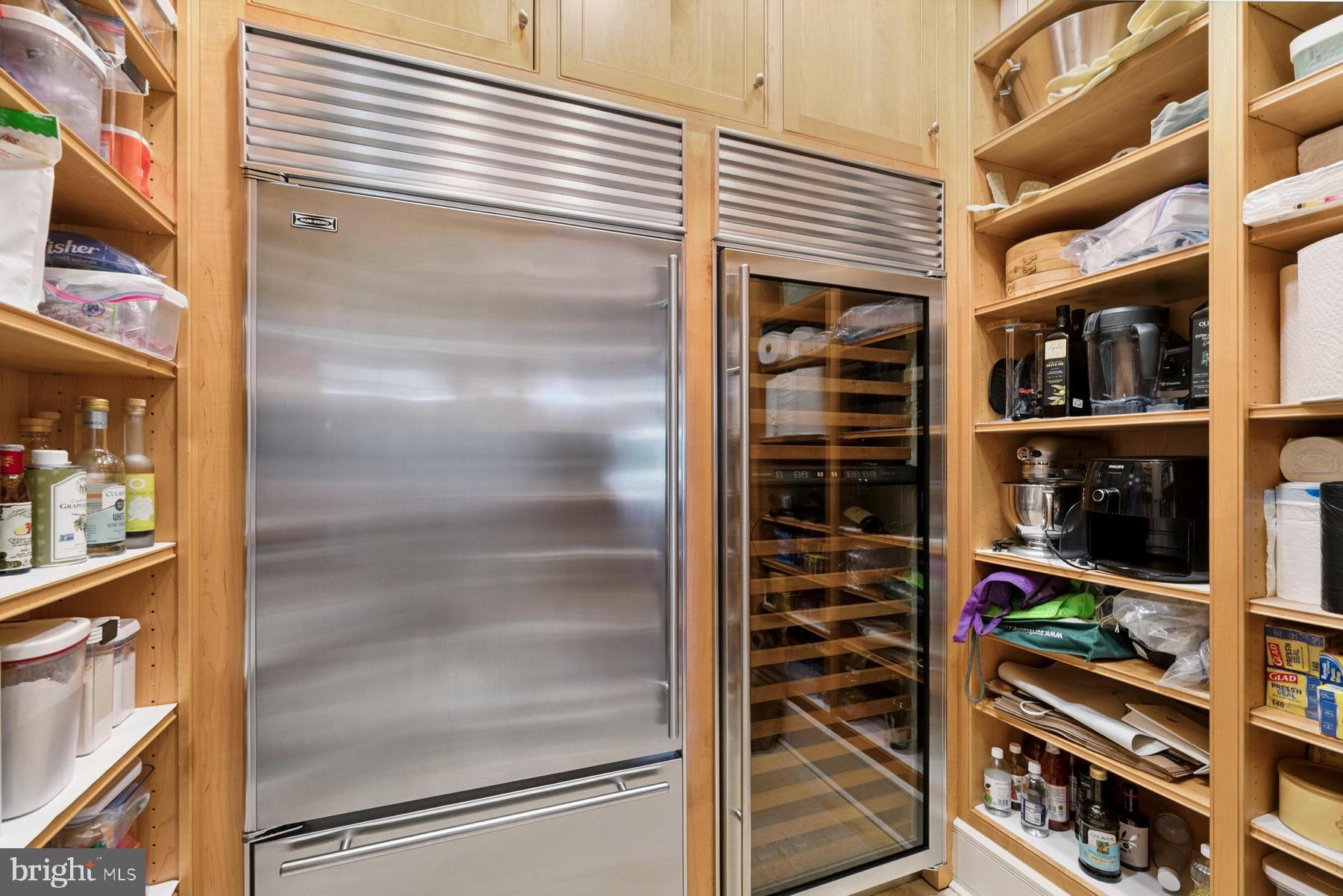 7090 Cooper Point Road Bozman, MD 21612 - Photo 31 of 86 a view of walk in closet with clothes and shoes