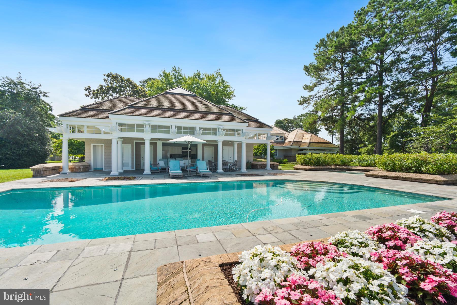 7090 Cooper Point Road Bozman, MD 21612 - Photo 58 of 86 a view of a house with a yard