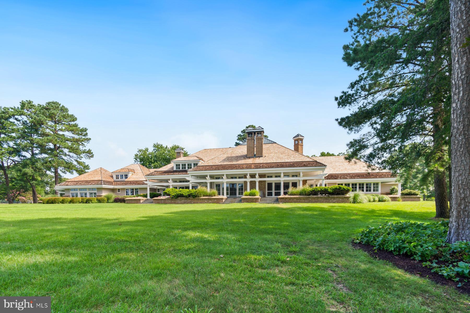 7090 Cooper Point Road Bozman, MD 21612 - Photo 72 of 86 a view of a house with a big yard