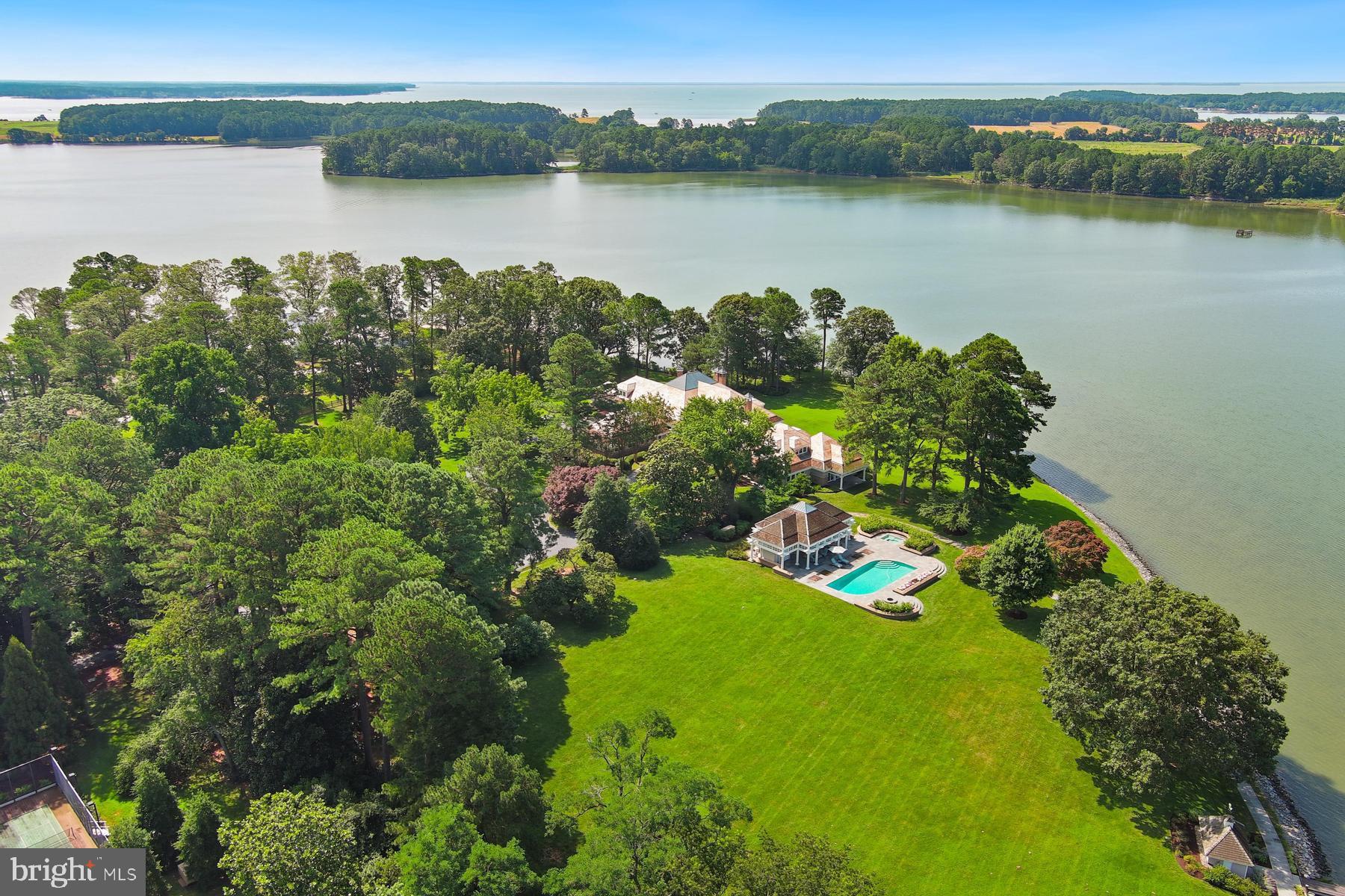 7090 Cooper Point Road Bozman, MD 21612 - Photo 84 of 86 a view of a lake with a mountain view