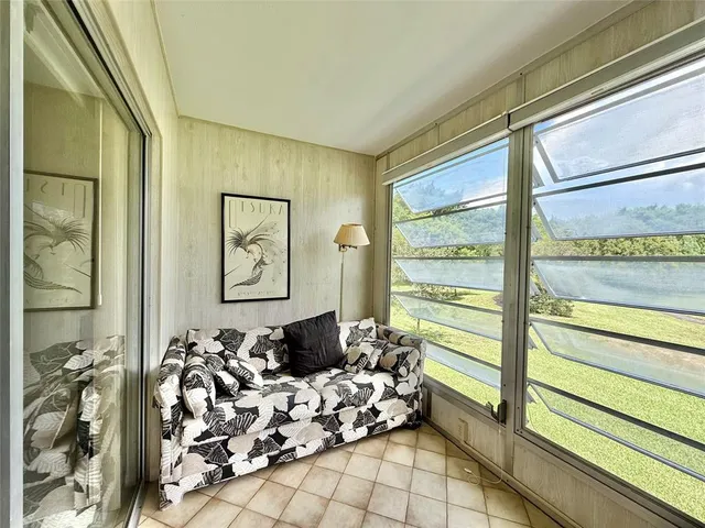 a view of a livingroom with furniture