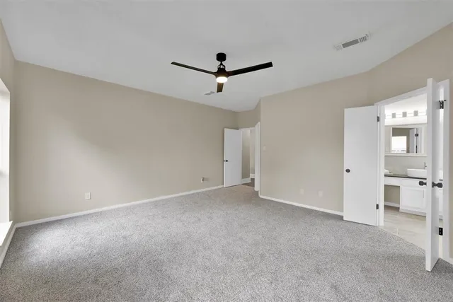 a view of a livingroom with a ceiling fan