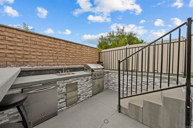 a view of swimming pool from a balcony
